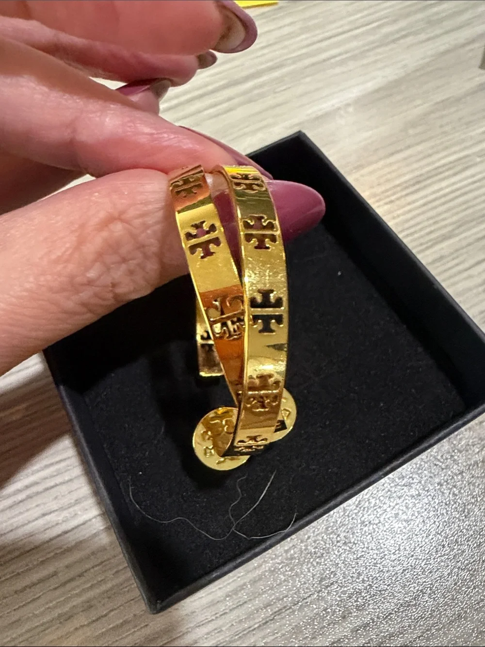 Tory Burch gold tone